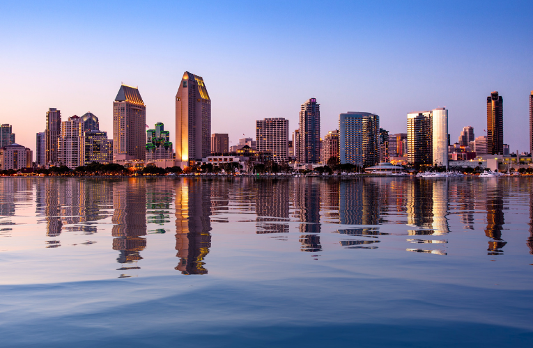 San Diego skyline at sunset showcasing the city’s waterfront and modern architecture, used to highlight innovation and energy transformation themes at DTECH 2026.